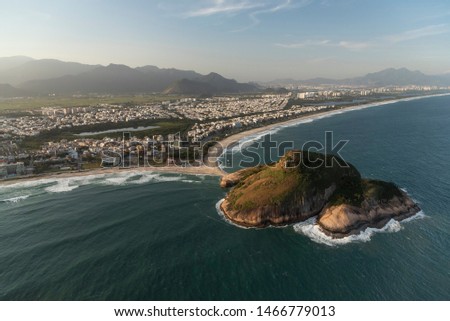 Beautiful aerial view from helicopter window to city and beach in Rio de Janeiro, Brazil