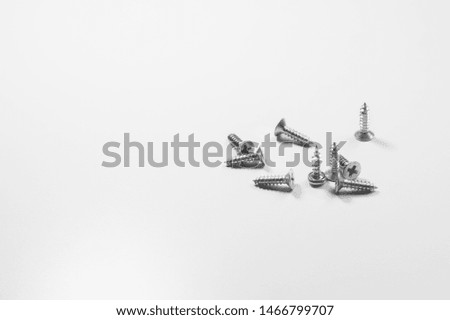 Screws on a white background. working tools