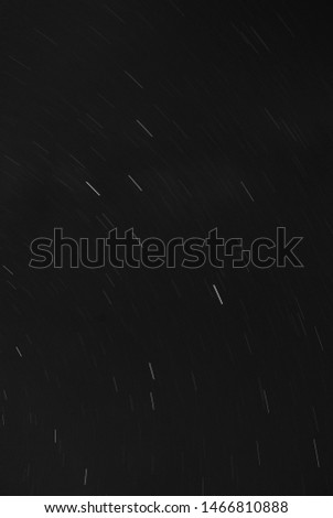 Star trails - taken above Italy, converted to be monochromatic in order to remove light pollution