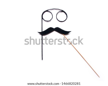 glasses and mustache on a stick on a white backgound
