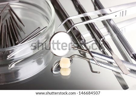 Set of dental tools for teeth care isolated on grey background Royalty-Free Stock Photo #146684507