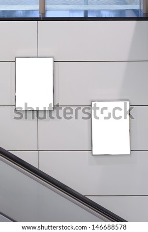 Two big vertical / portrait orientation blank billboard with escalator background