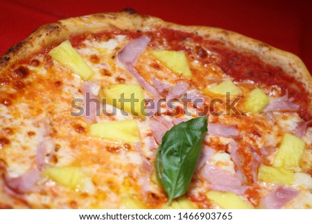 Italian 
Hawaiian Pizza with habahaca and pineapple