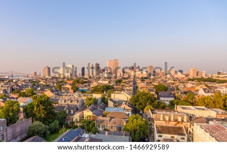 The downtown New Orleans, Louisiana skyline and the Mississippi River at sunrise