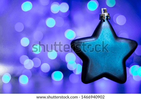 Christmas ornaments with blue background and bokeh