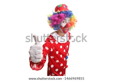 Cheerful clown showing thumbs up isolated on white background