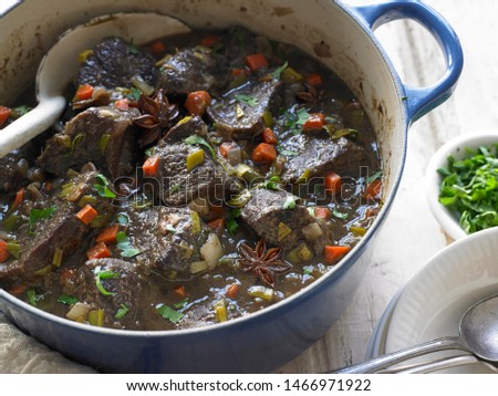 Beef Stew with vegetables in cast iron pot
