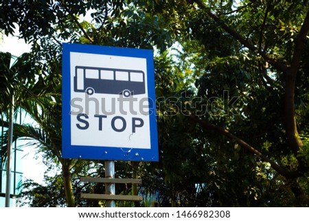 the sign of the bus stop.