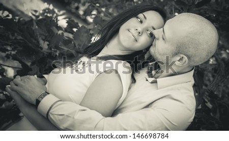 Black and white portrait of very beautiful couple.