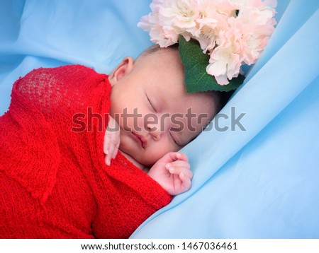 cute female baby newborn in lovely action, motherhood concept
