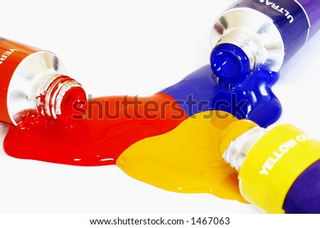 Red yellow and blue acrylic paints pouring from a tube. Colour can be easily changed to any colour using hue/saturation in photo package