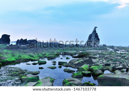 Majestic nature view of Batu Layar, Sawarna, Indonesia with nature composition.  Soft focus due to slow shutter technic.