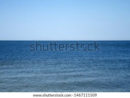 Beautiful sea background. Blue sea and blue sky.

