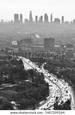 Downtown Los Angeles cityscape at smoggy day. Black and white photo