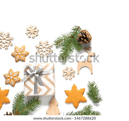 Christmas decor, gift box and cookies on white background