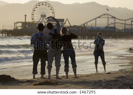 Tourists taking pictures at the Santa Monica Pier