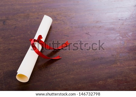 Diploma on wood table