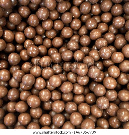 Chocolate candy balls. Dessert sweet nut in chocolate balls candies