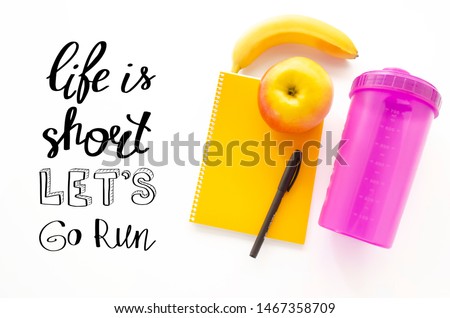Life is short let's go run. Handwritten lettering and sport equipment. Healthy lifestyle. Running and fitness. Colorful banner with motivational phrase. Sport theme.
