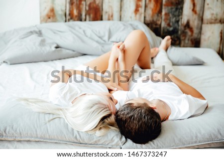 Lovely Couple In Bed Lying In Bedroom Images And Stock