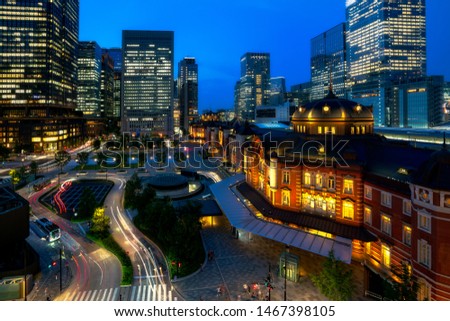 
Tokyo train station after sunset Which has beautiful lights from the surrounding buildings