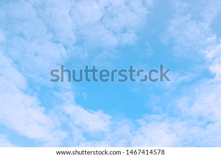 Blue sky with white clouds. Beautiful sky background and wallpaper. Clear day and good weather in the morning. 