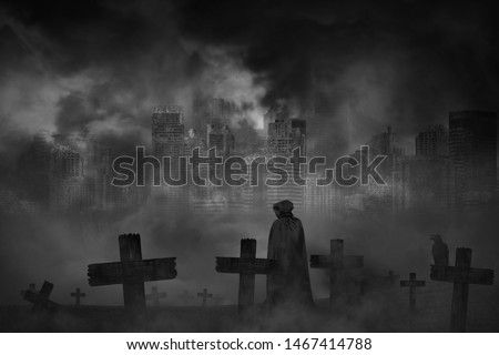 Scary background cemetery cross and the vampire with crow and abandoned large cities are covered with smoke from the civil war, concept of horror and war