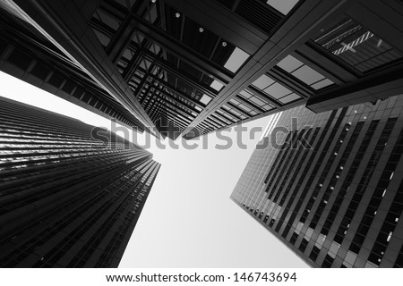 Black and white abstract upward view of downtown skyscrapers. Royalty-Free Stock Photo #146743694