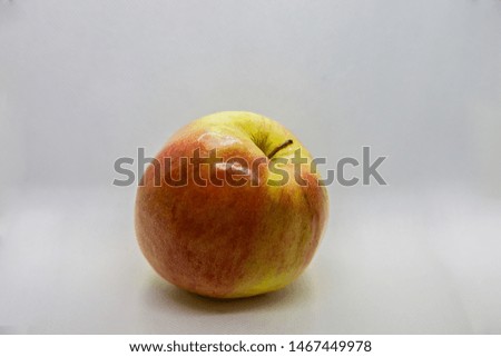 Polish apple isolated in the lightbox
