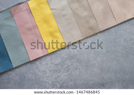 Colorful curtain fabric samples. Multiple color fabric texture samples selection fabrics for interior decoration. Curtains, tulle and furniture upholstery.