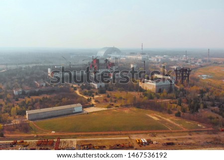 Chernobyl nuclear power plant, aerial view. Territory contaminated by radiation near Chernobyl NPP. Aerial view of Chernobyl NPP, Ukraine. Blank for design with copy space. Royalty-Free Stock Photo #1467536192