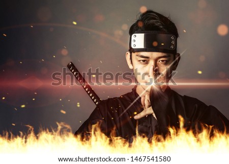 Japanese Ninja in fire. Samurai.