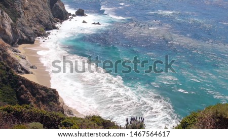 ocean waves stones on the beach