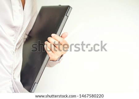 business man holding laptop isolated on white background 