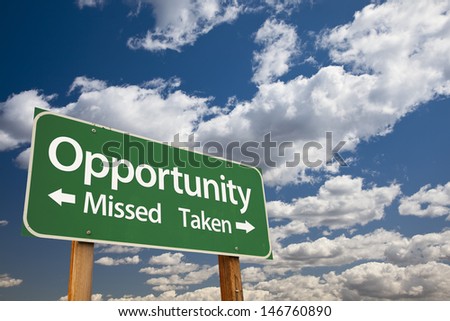 Opportunity Missed and Taken Green Road Sign Over Dramatic Blue Sky and Clouds. Royalty-Free Stock Photo #146760890