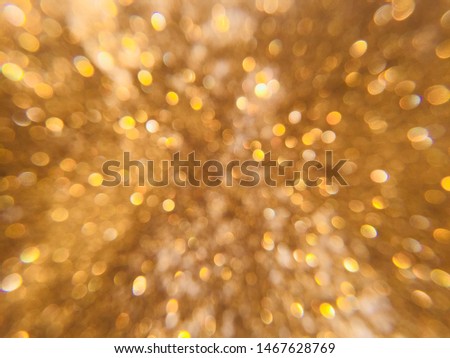 Blasting golden blurred bokeh abstract background