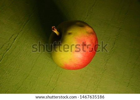 organic apples on green background
