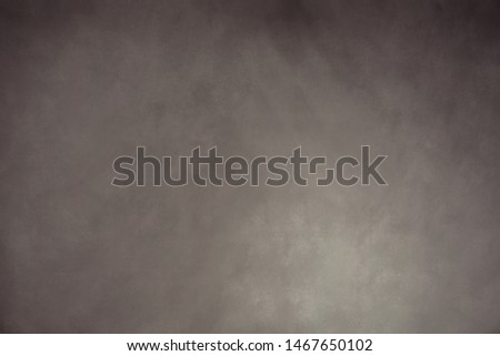 Traditional brown painted muslin or canvas fabric cloth studio background or backdrop Royalty-Free Stock Photo #1467650102