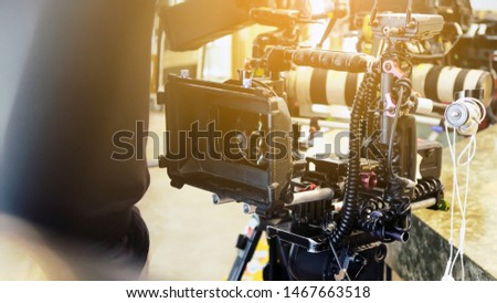 Film industry. Filming with professional camera background