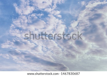 Photo of a cloudy sky. Beautiful natural phenomenon. Background for layouts and sites.