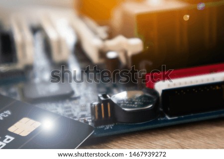 Blurred Credit card and Circuit of Cashless Society Concept.Technology payments without cash for convenience