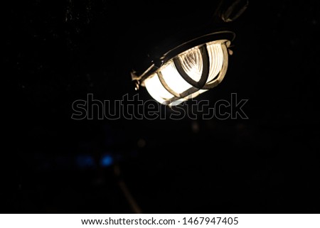 It is a photograph of the lamp in the cave