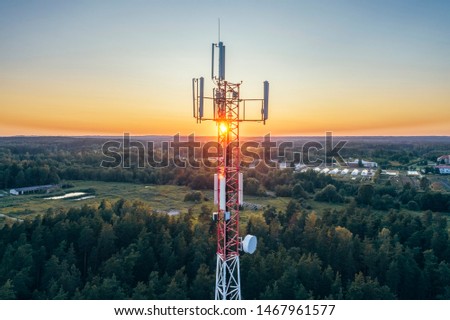Mobile communication tower during sunset from above. (high ISO image) Royalty-Free Stock Photo #1467961577