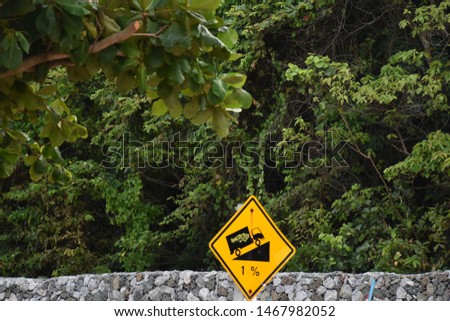 Warning signs for driving at steep mountains.