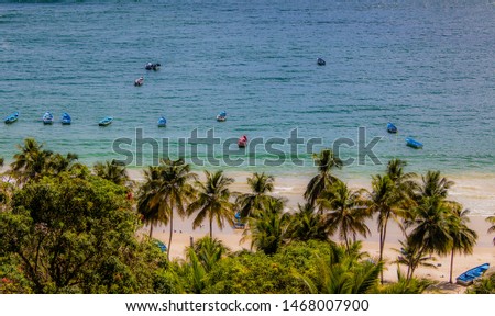 Fishing boats gather on Maracas Bay