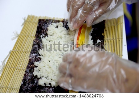 The picture of making rolled sushi.