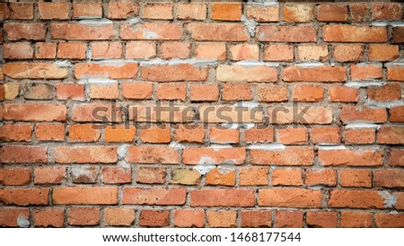 Brick wall background with space for your text and picture