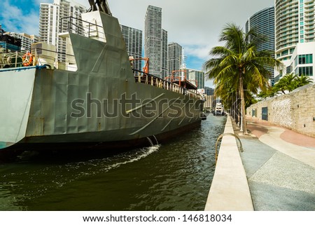 Cargo ship entering the Miami River in Downtown Miami.