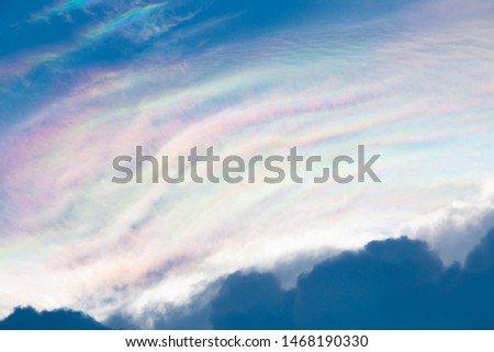 iridescent pileus cloud, rainbow clouds background, Cirrocumulus.