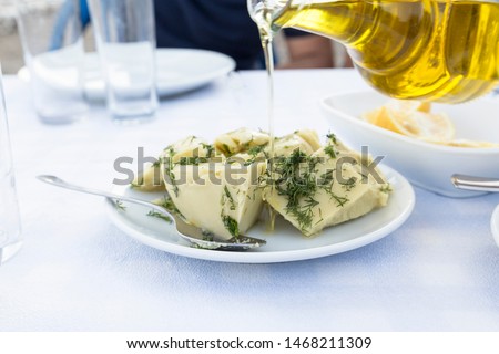 traditional fava with olive oil pouring from a bottle